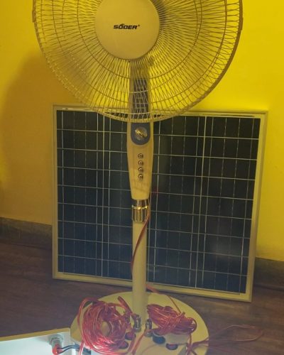 Portable solar system with fan and two bulbs and mobile charging option